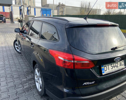 Чорний Форд Фокус, об'ємом двигуна 1 л та пробігом 190 тис. км за 7300 $, фото 4 на Automoto.ua