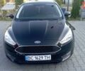 Чорний Форд Фокус, об'ємом двигуна 1.5 л та пробігом 235 тис. км за 10400 $, фото 1 на Automoto.ua