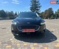 Чорний Форд Фокус, об'ємом двигуна 1.5 л та пробігом 230 тис. км за 14899 $, фото 1 на Automoto.ua