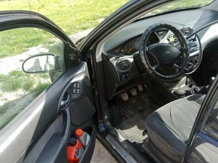 Черный Форд Фокус, объемом двигателя 1.8 л и пробегом 390 тыс. км за 3850 $, фото 1 на Automoto.ua