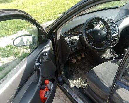 Черный Форд Фокус, объемом двигателя 1.8 л и пробегом 390 тыс. км за 3850 $, фото 1 на Automoto.ua