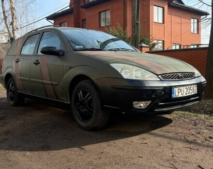 Черный Форд Фокус, объемом двигателя 1.8 л и пробегом 200 тыс. км за 1350 $, фото 1 на Automoto.ua