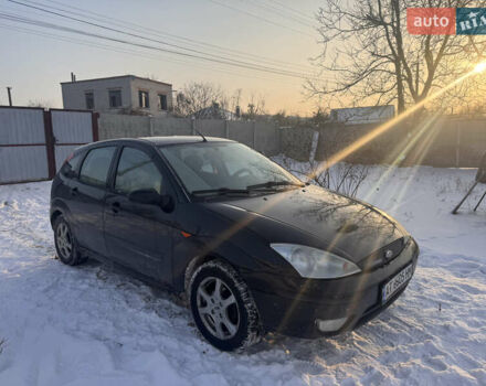 Черный Форд Фокус, объемом двигателя 1.8 л и пробегом 198 тыс. км за 2900 $, фото 1 на Automoto.ua