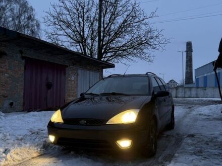 Черный Форд Фокус, объемом двигателя 1.8 л и пробегом 300 тыс. км за 1500 $, фото 1 на Automoto.ua
