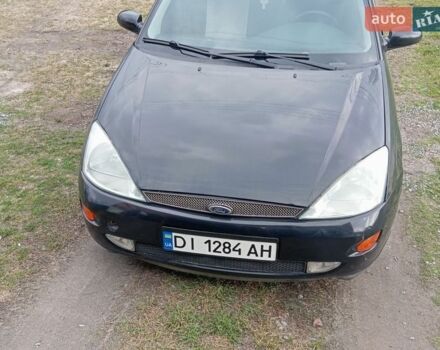 Черный Форд Фокус, объемом двигателя 1.8 л и пробегом 334 тыс. км за 2300 $, фото 1 на Automoto.ua