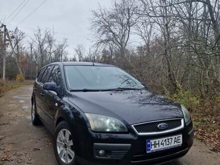 Черный Форд Фокус, объемом двигателя 1.6 л и пробегом 289 тыс. км за 4400 $, фото 1 на Automoto.ua