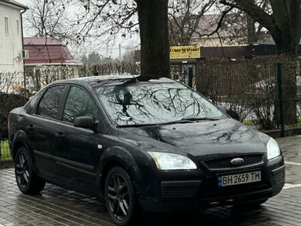 Черный Форд Фокус, объемом двигателя 1.39 л и пробегом 201 тыс. км за 4899 $, фото 1 на Automoto.ua