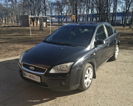 Черный Форд Фокус, объемом двигателя 1.6 л и пробегом 250 тыс. км за 3500 $, фото 1 на Automoto.ua