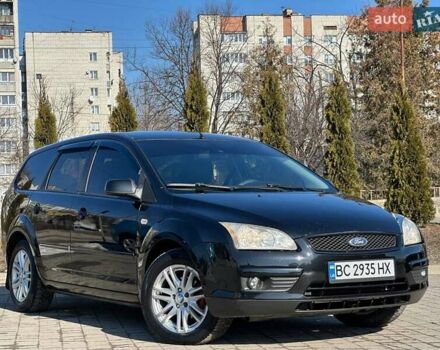 Черный Форд Фокус, объемом двигателя 1.6 л и пробегом 260 тыс. км за 4650 $, фото 1 на Automoto.ua