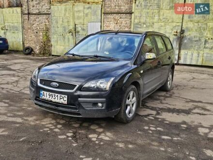 Черный Форд Фокус, объемом двигателя 1.8 л и пробегом 230 тыс. км за 2400 $, фото 1 на Automoto.ua