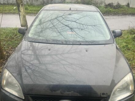 Черный Форд Фокус, объемом двигателя 1.6 л и пробегом 220 тыс. км за 2200 $, фото 1 на Automoto.ua