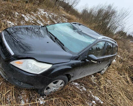 Черный Форд Фокус, объемом двигателя 1.6 л и пробегом 270 тыс. км за 2499 $, фото 1 на Automoto.ua