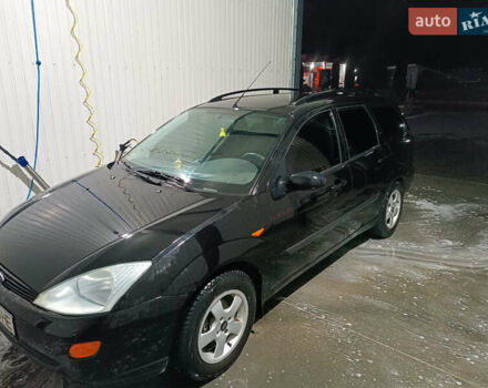 Черный Форд Фокус, объемом двигателя 1.4 л и пробегом 151 тыс. км за 3200 $, фото 1 на Automoto.ua