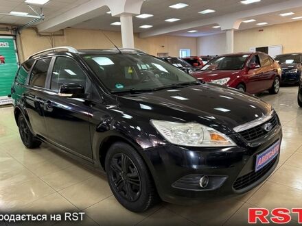 Черный Форд Фокус, объемом двигателя 1.8 л и пробегом 19300 тыс. км за 5400 $, фото 1 на Automoto.ua