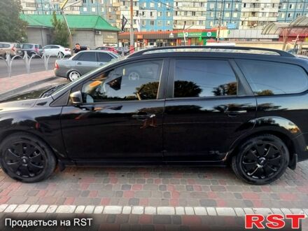 Чорний Форд Фокус, об'ємом двигуна 2 л та пробігом 382 тис. км за 5600 $, фото 1 на Automoto.ua