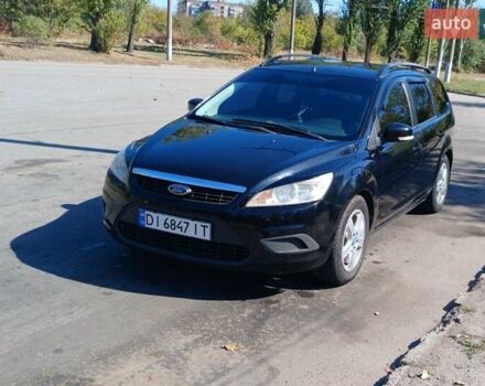 Черный Форд Фокус, объемом двигателя 1.6 л и пробегом 235 тыс. км за 5700 $, фото 1 на Automoto.ua