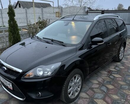 Черный Форд Фокус, объемом двигателя 1.6 л и пробегом 235 тыс. км за 5350 $, фото 1 на Automoto.ua