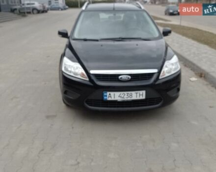 Черный Форд Фокус, объемом двигателя 1.6 л и пробегом 252 тыс. км за 5850 $, фото 1 на Automoto.ua