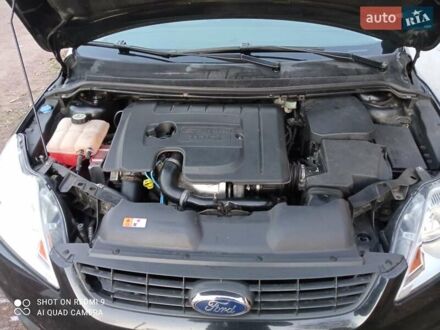 Черный Форд Фокус, объемом двигателя 1.6 л и пробегом 242 тыс. км за 5800 $, фото 1 на Automoto.ua
