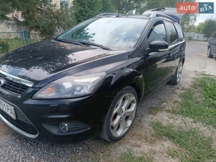 Чорний Форд Фокус, об'ємом двигуна 2 л та пробігом 306 тис. км за 5600 $, фото 1 на Automoto.ua