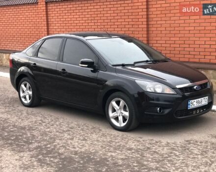 Черный Форд Фокус, объемом двигателя 1.6 л и пробегом 300 тыс. км за 4650 $, фото 1 на Automoto.ua
