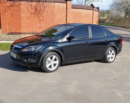 Черный Форд Фокус, объемом двигателя 1.6 л и пробегом 300 тыс. км за 4650 $, фото 1 на Automoto.ua