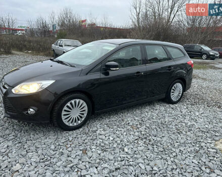 Черный Форд Фокус, объемом двигателя 1.6 л и пробегом 233 тыс. км за 6400 $, фото 1 на Automoto.ua
