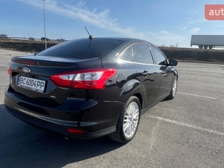 Чорний Форд Фокус, об'ємом двигуна 2 л та пробігом 170 тис. км за 7500 $, фото 1 на Automoto.ua