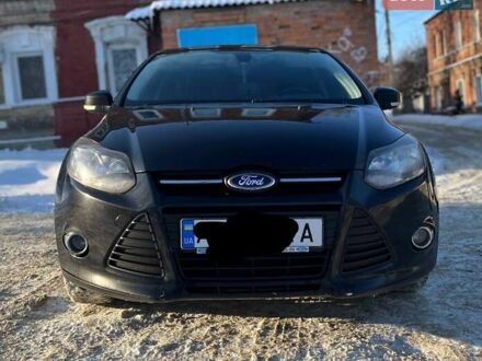 Черный Форд Фокус, объемом двигателя 1.6 л и пробегом 250 тыс. км за 7100 $, фото 1 на Automoto.ua