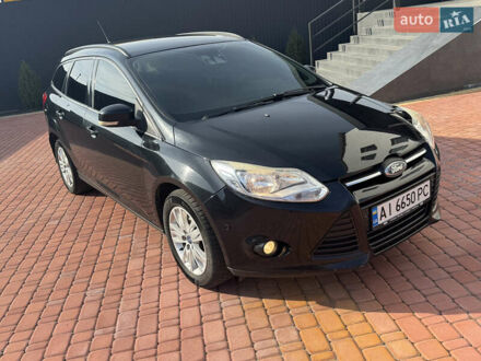 Чорний Форд Фокус, об'ємом двигуна 1.56 л та пробігом 266 тис. км за 6499 $, фото 1 на Automoto.ua