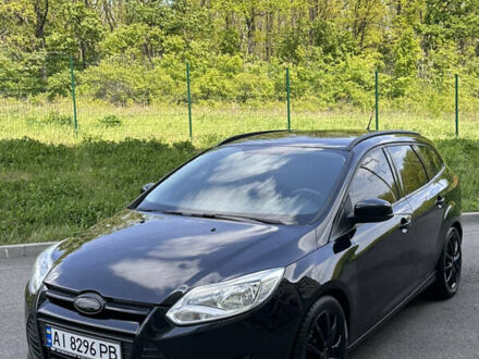 Черный Форд Фокус, объемом двигателя 1.56 л и пробегом 230 тыс. км за 8200 $, фото 1 на Automoto.ua