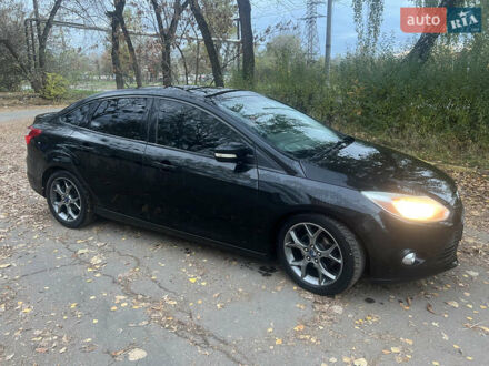 Чорний Форд Фокус, об'ємом двигуна 2 л та пробігом 163 тис. км за 7700 $, фото 1 на Automoto.ua