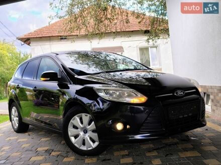 Чорний Форд Фокус, об'ємом двигуна 1.56 л та пробігом 265 тис. км за 6099 $, фото 1 на Automoto.ua