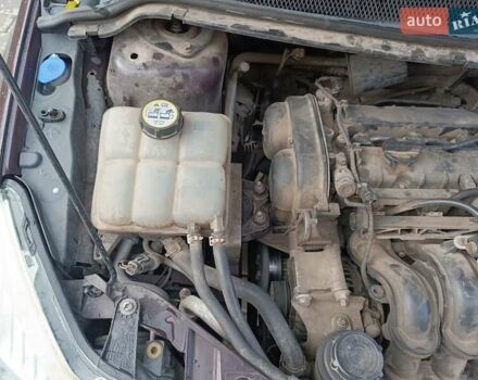 Фиолетовый Форд Фокус, объемом двигателя 1.6 л и пробегом 280 тыс. км за 5400 $, фото 53 на Automoto.ua