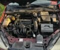 Червоний Форд Фокус, об'ємом двигуна 1.6 л та пробігом 375 тис. км за 2444 $, фото 6 на Automoto.ua