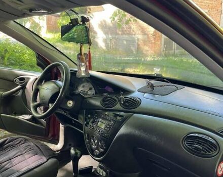 Красный Форд Фокус, объемом двигателя 1.6 л и пробегом 157 тыс. км за 2700 $, фото 2 на Automoto.ua