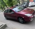 Красный Форд Фокус, объемом двигателя 2 л и пробегом 158 тыс. км за 4200 $, фото 1 на Automoto.ua