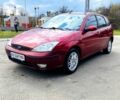 Красный Форд Фокус, объемом двигателя 1.6 л и пробегом 247 тыс. км за 2950 $, фото 1 на Automoto.ua