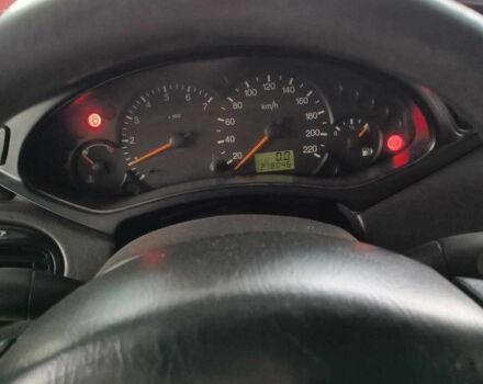 Красный Форд Фокус, объемом двигателя 1.8 л и пробегом 218 тыс. км за 5300 $, фото 12 на Automoto.ua