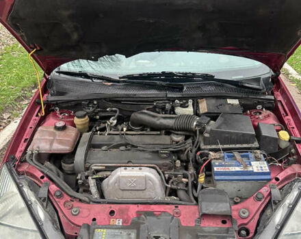 Красный Форд Фокус, объемом двигателя 2 л и пробегом 193 тыс. км за 2500 $, фото 7 на Automoto.ua