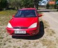 Красный Форд Фокус, объемом двигателя 1.8 л и пробегом 330 тыс. км за 2900 $, фото 1 на Automoto.ua