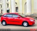 Красный Форд Фокус, объемом двигателя 1.4 л и пробегом 250 тыс. км за 2550 $, фото 1 на Automoto.ua