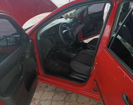 Красный Форд Фокус, объемом двигателя 1.8 л и пробегом 218 тыс. км за 5300 $, фото 7 на Automoto.ua