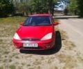 Красный Форд Фокус, объемом двигателя 1.8 л и пробегом 330 тыс. км за 2500 $, фото 1 на Automoto.ua