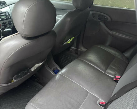 Красный Форд Фокус, объемом двигателя 2 л и пробегом 193 тыс. км за 2500 $, фото 4 на Automoto.ua