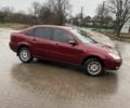 Червоний Форд Фокус, об'ємом двигуна 1.8 л та пробігом 250 тис. км за 2000 $, фото 2 на Automoto.ua