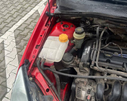 Червоний Форд Фокус, об'ємом двигуна 1.6 л та пробігом 167 тис. км за 2400 $, фото 25 на Automoto.ua