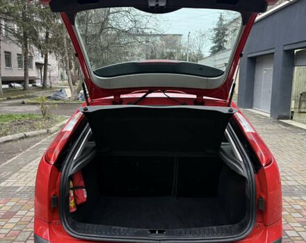 Червоний Форд Фокус, об'ємом двигуна 1.6 л та пробігом 242 тис. км за 4900 $, фото 4 на Automoto.ua