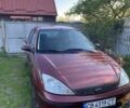 Красный Форд Фокус, объемом двигателя 1.6 л и пробегом 179 тыс. км за 3800 $, фото 1 на Automoto.ua