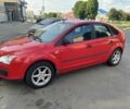 Красный Форд Фокус, объемом двигателя 1.4 л и пробегом 290 тыс. км за 3000 $, фото 1 на Automoto.ua